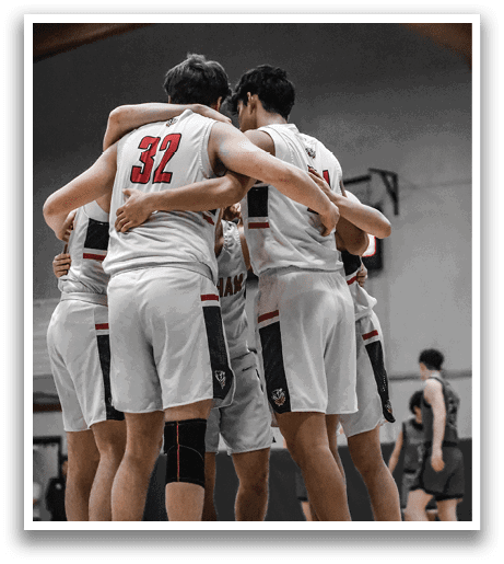 A group of men wearing white uniforms huddle together on a basketball court. AI generated content