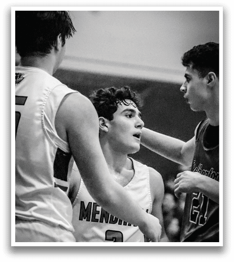 Three men are playing basketball, with one player holding his head in his hands. AI generated content