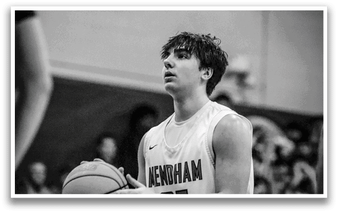 A basketball player wearing a white jersey with the number 38 on it holds a basketball in his hands. AI generated content