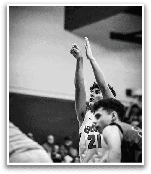 Two men playing basketball, one with a raised hand, the other with a raised hand and a number 20 on his shirt. AI generated content