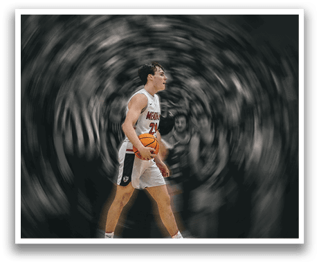 A man is walking on a basketball court holding a basketball. AI generated content