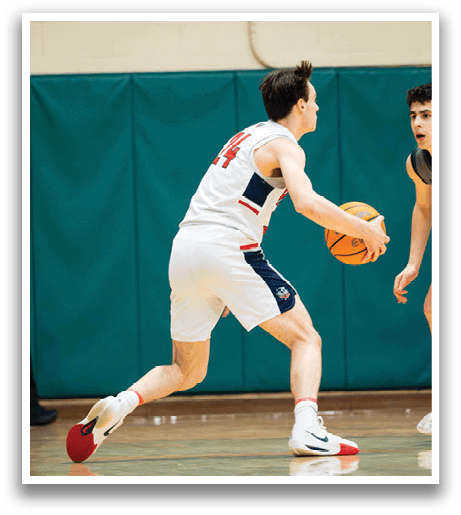 A basketball player wearing a white uniform is running with a basketball in his hand. AI generated content