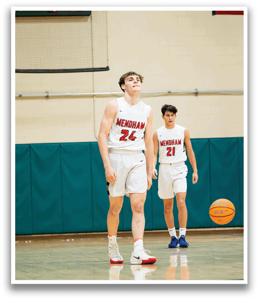 Two basketball players on a court, one with the number 22 on his jersey. AI generated content