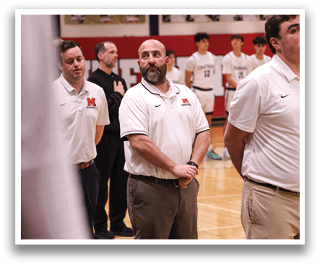 A group of people are standing on a basketball court, with one man wearing a white shirt and a tie. AI generated content