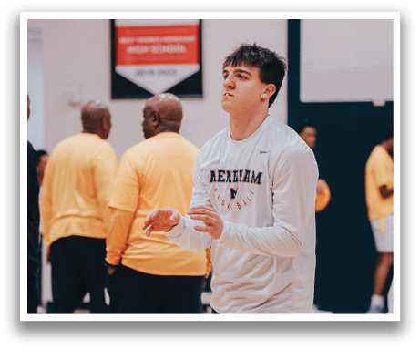 A man in a white shirt and black shorts is holding a frisbee. AI generated content