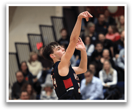 A basketball player is in the air, attempting to shoot the ball. AI generated content