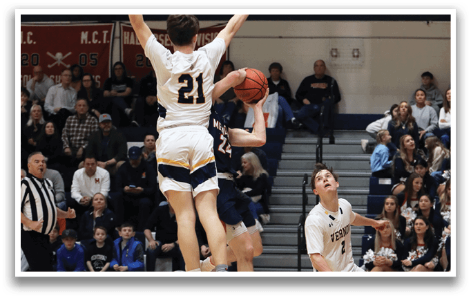 A basketball player jumps in the air to grab the ball. AI generated content