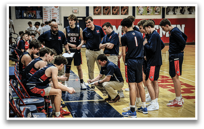 A group of men are gathered on a basketball court, some sitting on chairs and others standing. They are engaged in a discussion, possibly about the game or strategy. The men are wearing sports uniforms, indicating that they are part of a team. AI generated content