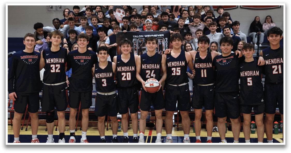 A group of young men pose for a photo on a basketball court. AI generated content