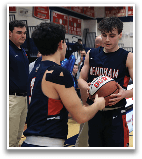Two basketball players are talking to each other while holding a basketball. AI generated content