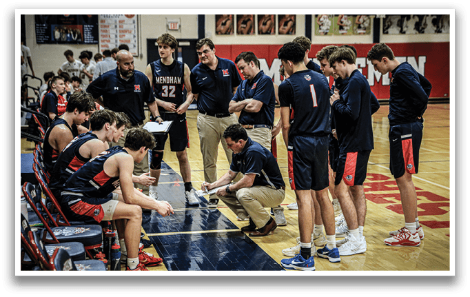 A group of men are gathered on a basketball court, some sitting on chairs and others standing. They are engaged in a discussion, possibly about the game or strategy. The men are wearing sports uniforms, indicating that they are part of a team. AI generated content