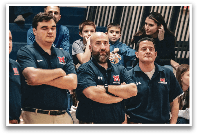 Three men wearing suits and ties stand on a basketball court. AI generated content