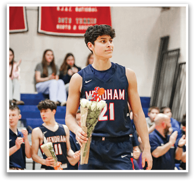 A man holding a bouquet of flowers is standing in front of a crowd of people. AI generated content