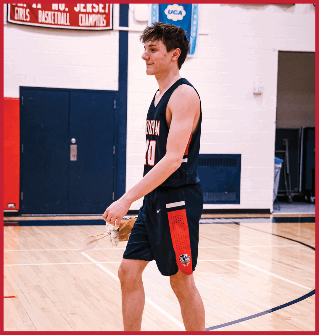 A man wearing a basketball uniform is walking on a basketball court. AI generated content