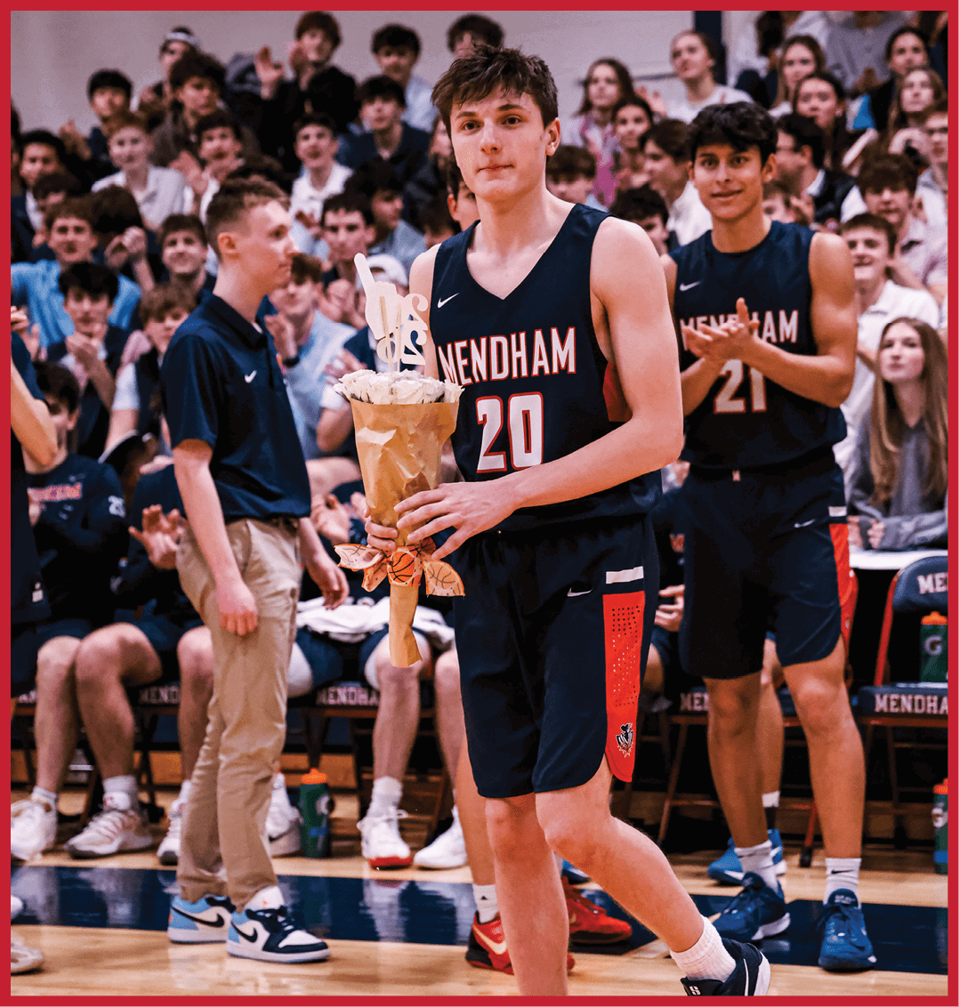 A boy holds a bouquet of flowers while walking on a basketball court. AI generated content