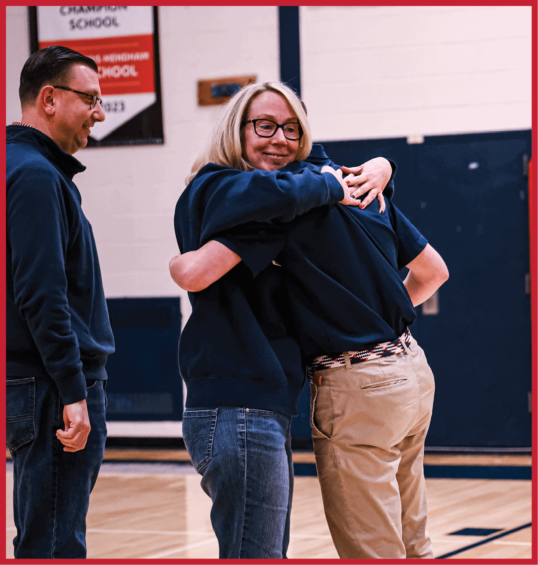Two people hugging on a basketball court. AI generated content