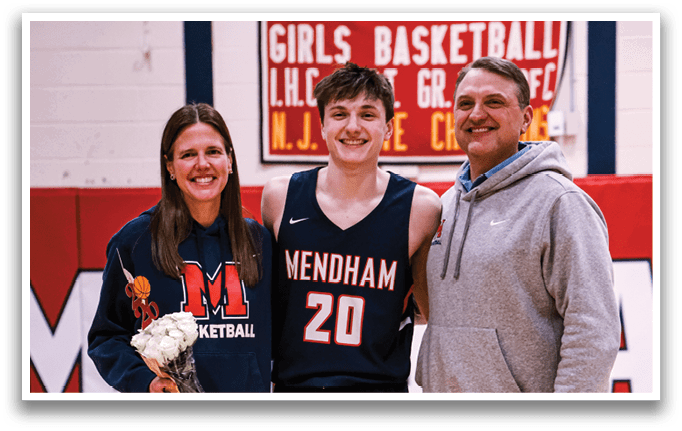 A man and woman pose with a basketball player in a gym. AI generated content