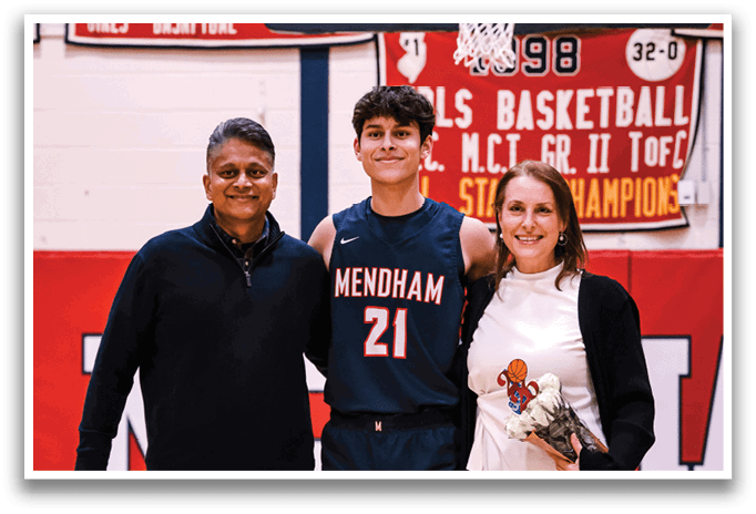 A man and woman pose with a basketball player in front of a hoop. AI generated content
