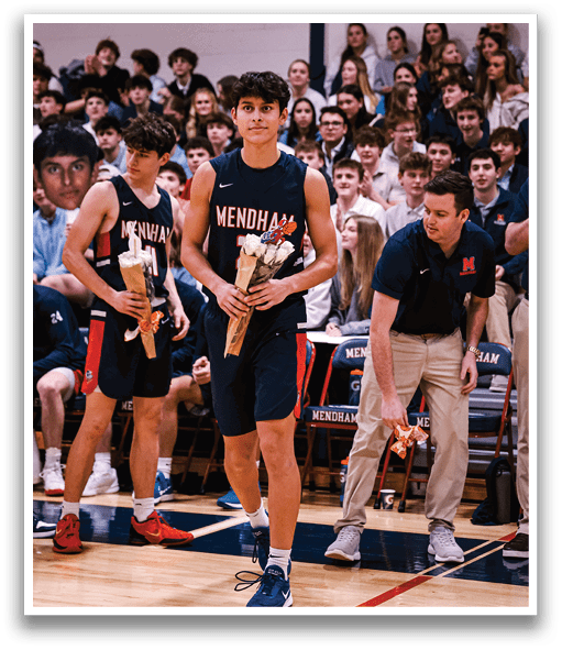 A basketball player holds a bouquet of flowers while walking on the court. AI generated content