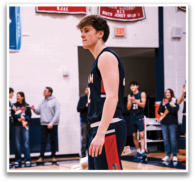 A basketball player wearing a blue uniform walks on the court. AI generated content