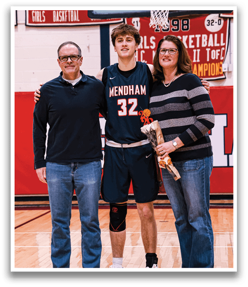 A man and woman pose with a basketball player in a gym. AI generated content