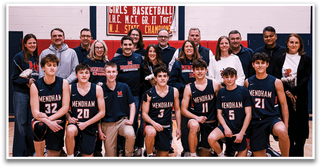 A group of people, including a boy and a girl, pose for a picture in front of a basketball hoop. AI generated content