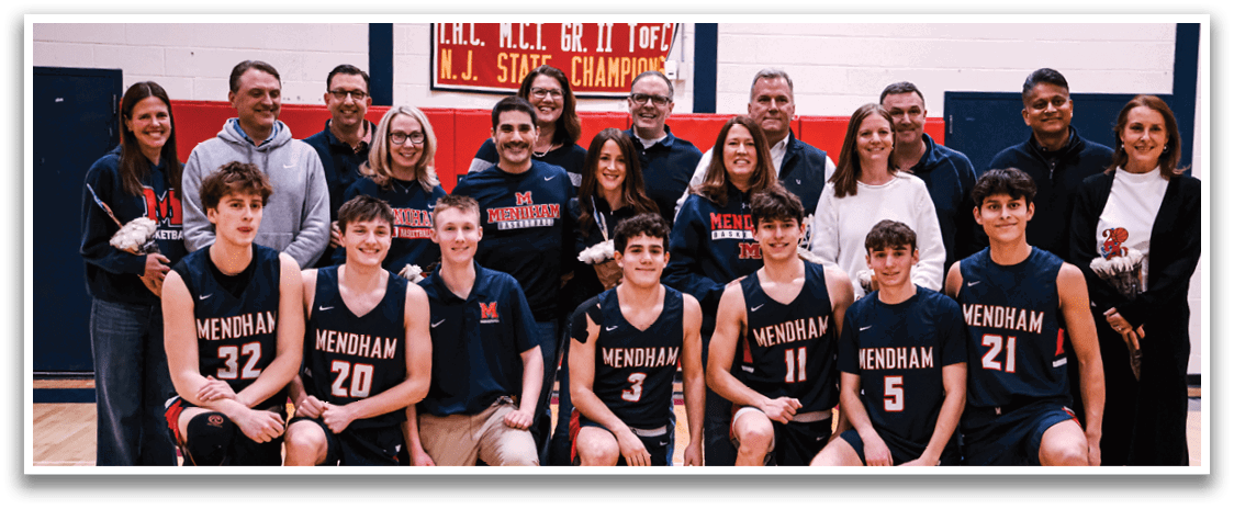 A group of people, including boys and girls, pose for a photo on a basketball court. AI generated content