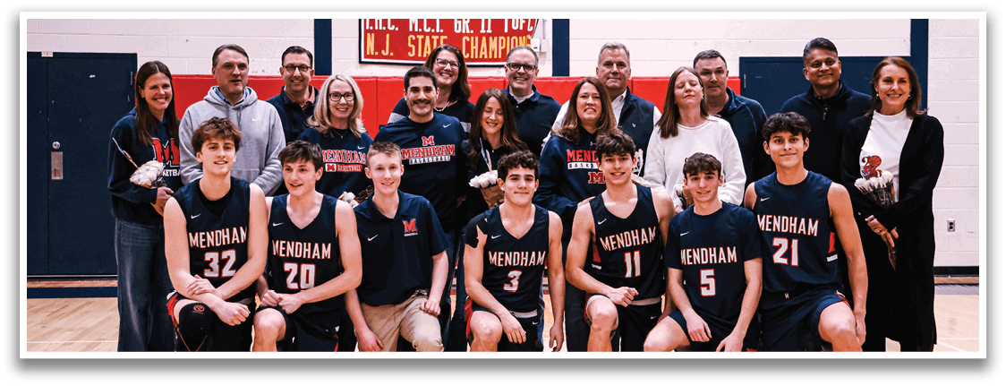 A group of people, including boys and girls, pose for a photo on a basketball court. AI generated content