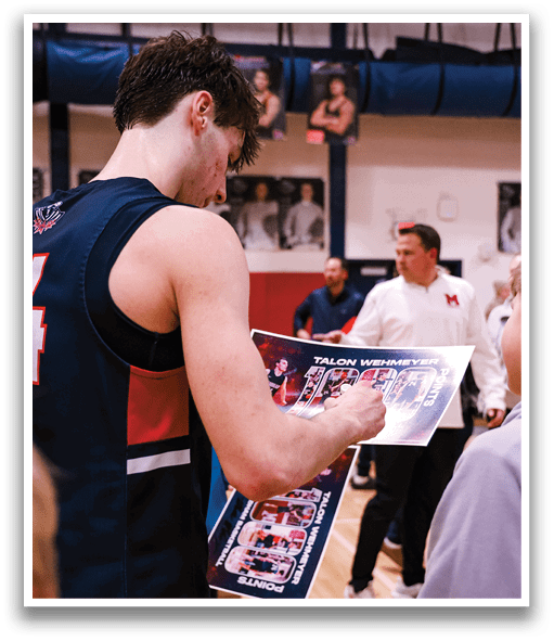 A man in a basketball uniform is signing autographs for fans. AI generated content