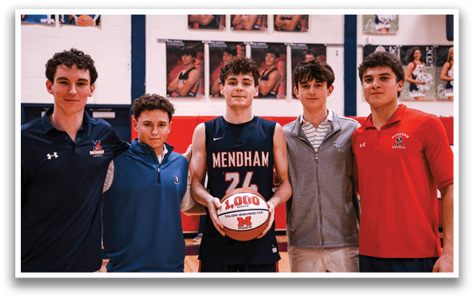 A group of five young men pose for a picture with a basketball. AI generated content