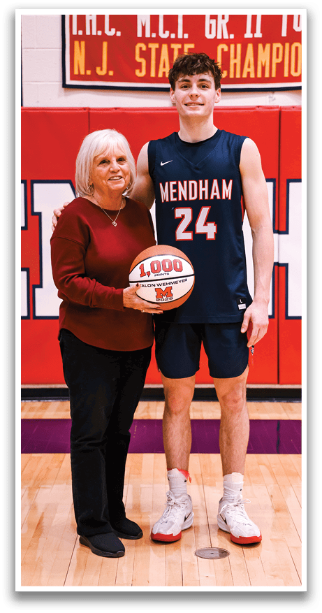 A woman holds a basketball while standing next to a man who is taller than her. AI generated content