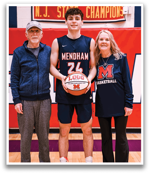 A man and woman pose with a basketball player who is holding a basketball. AI generated content
