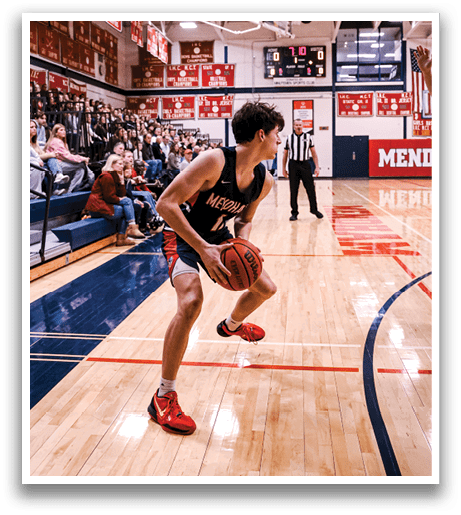 A basketball player is holding a ball on a court, surrounded by a crowd of spectators. AI generated content