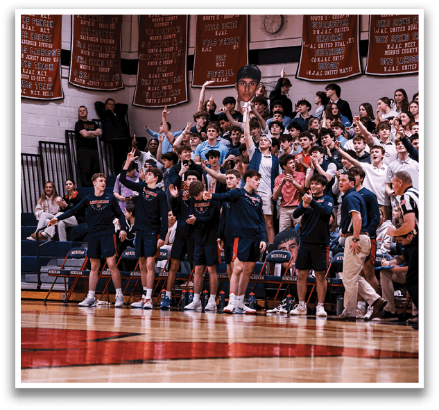 A group of people are standing on a basketball court, some of them holding up their arms. AI generated content