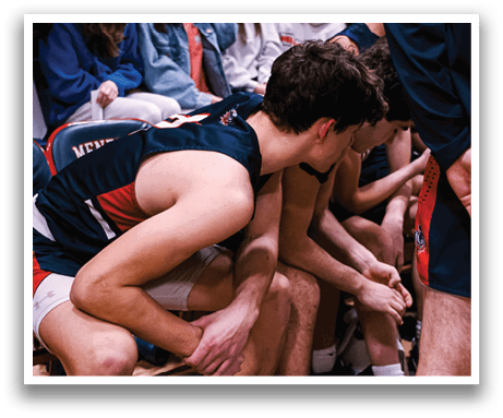 A group of people, including a man and a woman, are sitting on a bench. The man is wearing a blue shirt and the woman is wearing a white shirt. The man is sitting on the bench with his legs crossed. AI generated content