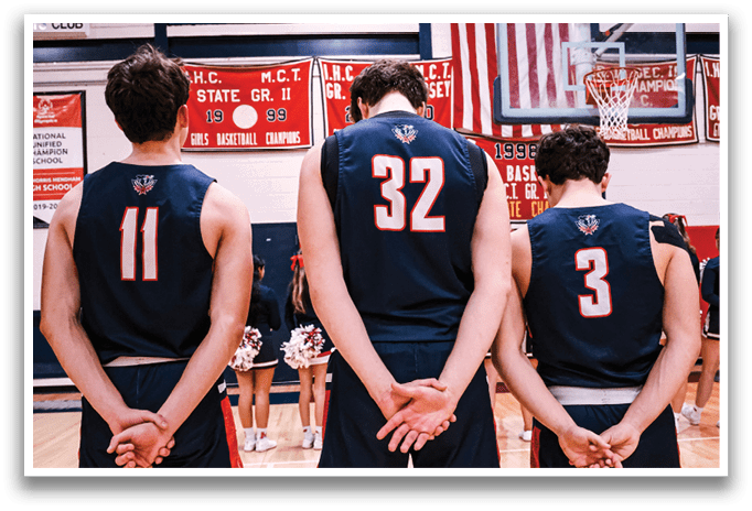 Three basketball players wearing blue uniforms and white shoes stand on a basketball court. AI generated content