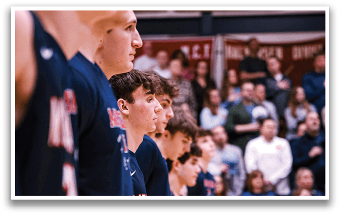 A group of young men wearing basketball uniforms stand on a basketball court. AI generated content