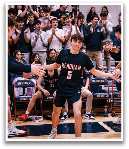 A basketball player wearing a number 5 jersey is holding his arms out to the crowd, who are clapping and cheering. AI generated content