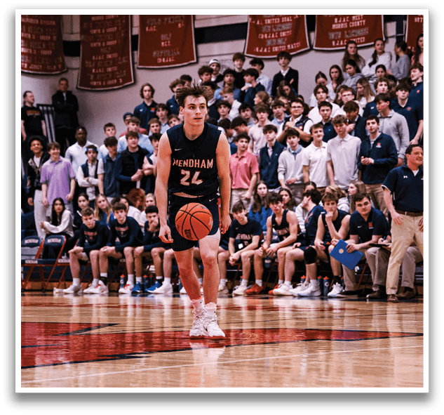 A basketball player wearing a number 22 jersey is holding a basketball on a basketball court. AI generated content