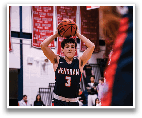 A basketball player in a black jersey holds the ball in his hands. AI generated content