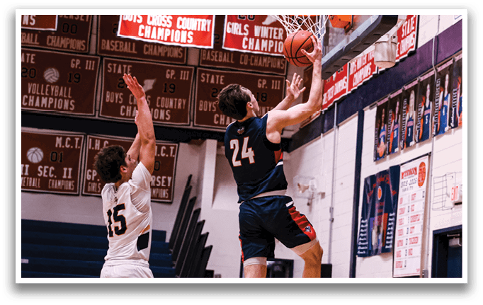 Two basketball players are jumping for the ball, one on the left and one on the right. The player on the left is wearing a white shirt and the player on the right is wearing a blue shirt. The basketball is in the air between them. AI generated content