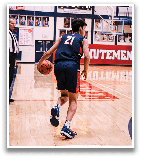 A basketball player in a blue uniform is running on the court with a basketball in his hand. AI generated content