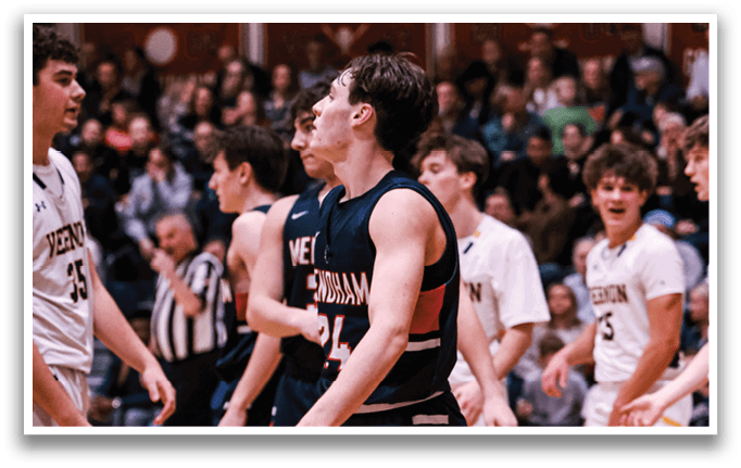 A group of young men playing basketball on a court. AI generated content