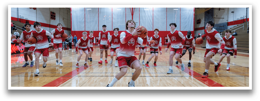 A man in a red basketball uniform is playing basketball. AI generated content