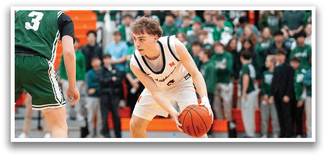 Two basketball players on the court, one holding a basketball. AI generated content