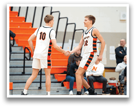 Two men shake hands on a basketball court. AI generated content