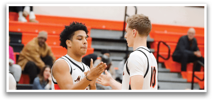 Two men wearing basketball uniforms are shaking hands on the court. AI generated content