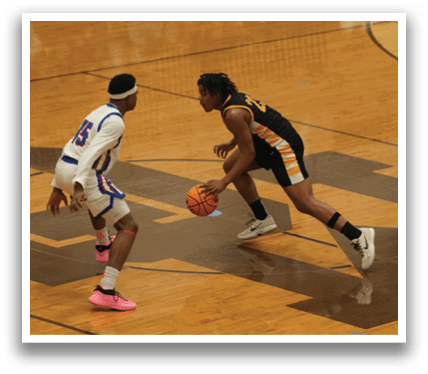 A group of men playing basketball on a court. Contenido generado con IA