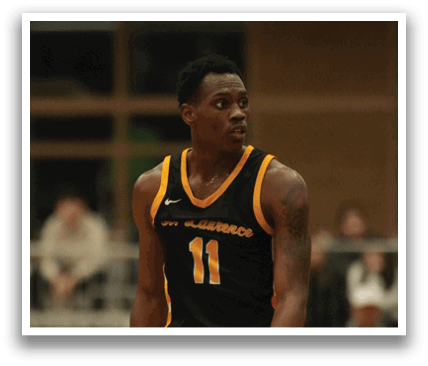 A man wearing a basketball uniform stands on a basketball court. Contenido generado con IA