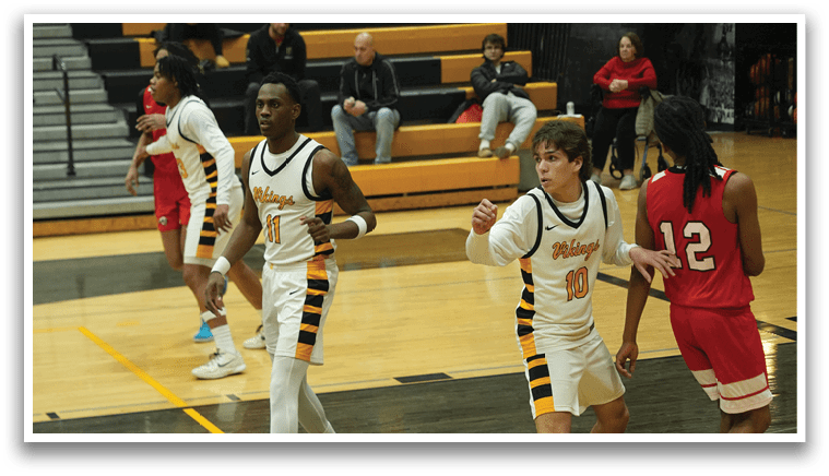 A group of men playing basketball on a court. AI generated content
